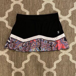 Sofibella tennis skirt, black with paisley print size medium